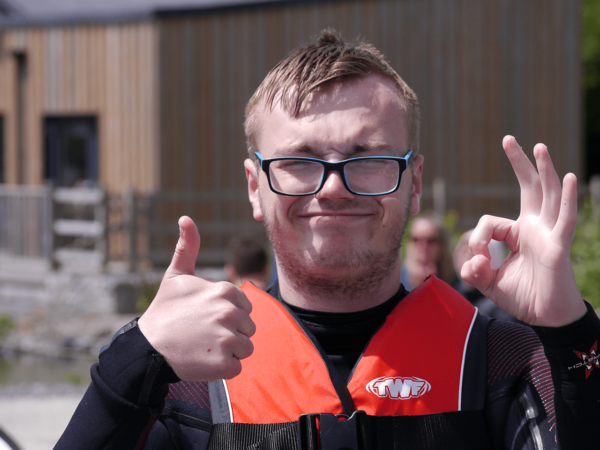 Celebrating a fantastic day at Trevassack Lake, this learner shows their enthusiasm and joy, making the most of the Inclusive Games.