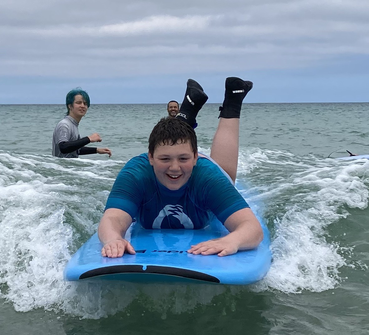 Three Bridges learners taking part in Surf Therapy sessions with The Wave Project, building confidence, emotional regulation and new skills in a supportive coastal environment.